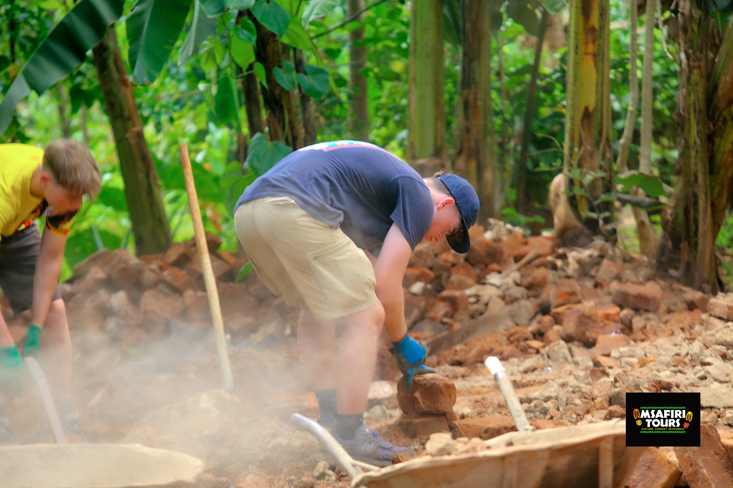 Construction Volunteering in Uganda – Build a Better Future with Msafiri Tours Uganda construction volunteer opportunities | Volunteer abroad on construction projects in Uganda Join hands with local communities and make a lasting difference through our construction volunteer programs in Uganda. Whether you’re passionate about building schools, improving homes, or creating essential infrastructure like health clinics and water systems, your efforts will help transform lives and uplift entire communities. Volunteer on Construction Projects in Uganda Our Uganda construction volunteering opportunities provide a hands-on way to contribute to impactful projects across the country. Volunteers help build and renovate schools, homes, health centers, rainwater harvesting systems, and sanitation facilities. You may also assist in creating ramps for wheelchair access and other disability-friendly infrastructure, using both traditional and environmentally sustainable building methods. No prior construction experience? No problem! We welcome enthusiastic volunteers from all backgrounds. You’ll receive guidance from experienced local foremen and be trained in basic building techniques. Why Volunteer for Construction in Uganda? Make a tangible difference by helping underserved communities access safe, functional buildings. Develop practical skills in construction, teamwork, and project planning. Engage with local culture while working alongside Ugandan builders and families. Explore East Africa—combine your volunteering with unforgettable travel and wildlife experiences. Typical Construction Volunteer Projects in Uganda As a construction volunteer, your tasks may include: Building and renovating homes, classrooms, and medical clinics Constructing community infrastructure like libraries, orphanages, and sanitation facilities Installing water tanks, irrigation systems, or greenhouses Painting, plastering, digging foundations, laying bricks, roofing, and leveling Renovating buildings damaged by natural disasters Assisting with maintenance work on older structures What You’ll Need for Your Construction Volunteering Trip Valid Passport & Visa: Most travelers enter Uganda on a tourist visa, valid for 90 days. Visa extensions are possible. Medical Insurance: Volunteers must have coverage throughout their stay. Minimum Stay: 2 weeks (1-week options available) English Requirements: No formal level required Daily Work Schedule Minimum duration: 1 week (2+ weeks recommended for deeper impact) Working hours: 3–4 hours/day, Monday to Friday (morning or afternoon shifts) Project locations: Walkable or accessible via local transport What’s Included in the Program Airport pick-up and orientation Comfortable accommodations Two meals per day (breakfast and dinner) 3–4 hours/day of practical volunteer work 24/7 in-country support Official certificate and letter of recommendation Personal Growth & Soft Skills Developed Construction volunteering in Uganda is more than just building—it’s about connection, community, and growth. Through your experience, you’ll develop: Teamwork and leadership Adaptability and cultural sensitivity Problem-solving and creativity A strong work ethic and sense of purpose Respect for diversity and different perspectives No Experience? No Problem! You don’t need to be an architect or engineer to join. Our team will train you in the basics, and your willingness to learn and contribute is what truly matters. First-time volunteers often bring fresh ideas and energy that enrich the entire experience. Ready to Join a Construction Volunteer Project in Uganda? Whether you’re a gap-year student, skilled tradesperson, or someone looking for a meaningful way to give back, Msafiri Tours' construction volunteering programs in Uganda offer the chance to build something that matters—literally and figuratively. Join us today and help create lasting change, one brick at a time.